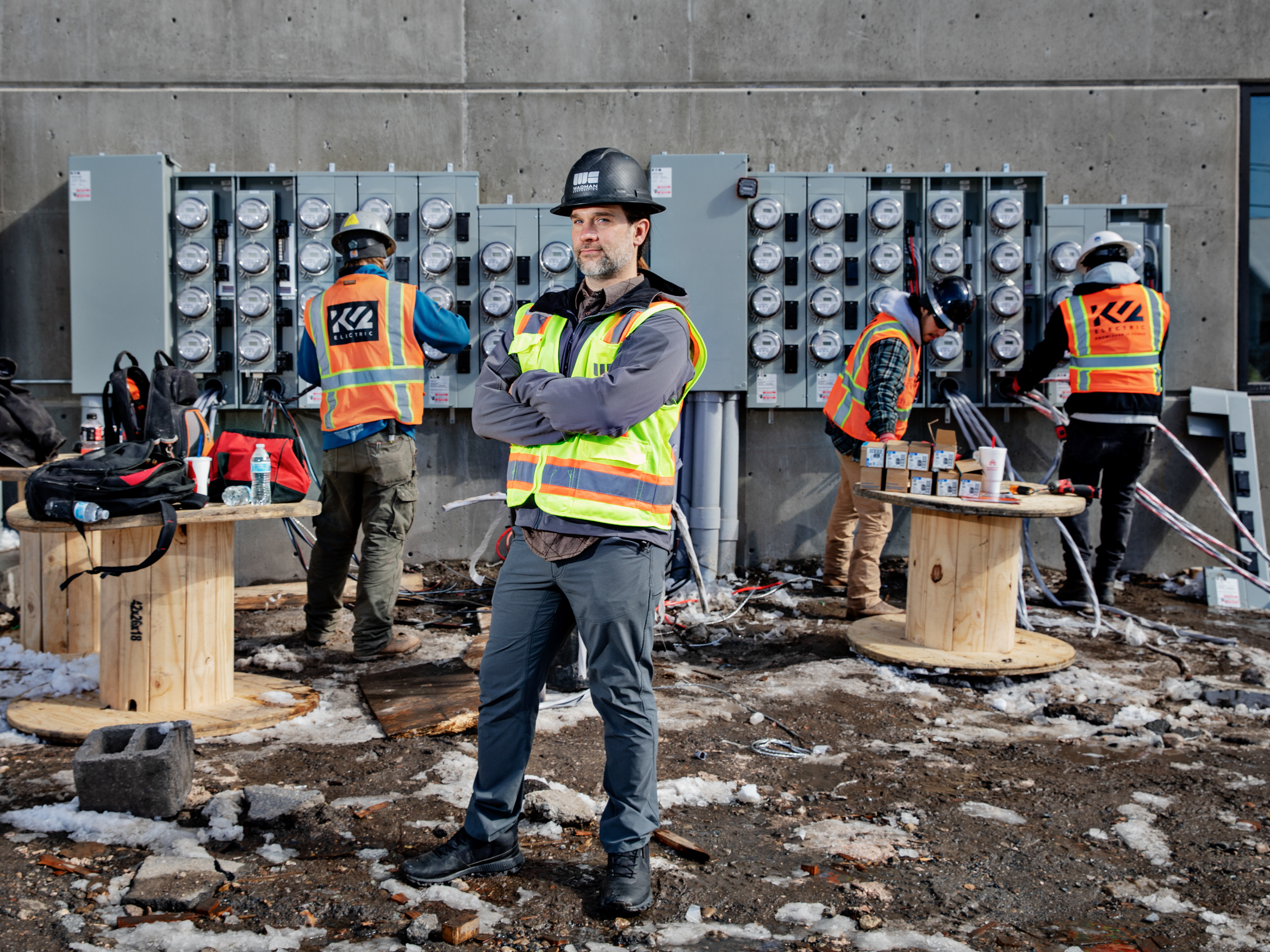 caption: Tyler Hollon, who works for a construction company in Utah, says eliminating natural gas from apartment buildings can reduce costs. Hollon's company now shares its designs and budgets with other builders. "The reason we're giving it away is to clean up the air," Hollon says. "We want everybody to do it. It's everybody's air that we're all breathing. Makes my mountain bike ride that much easier."