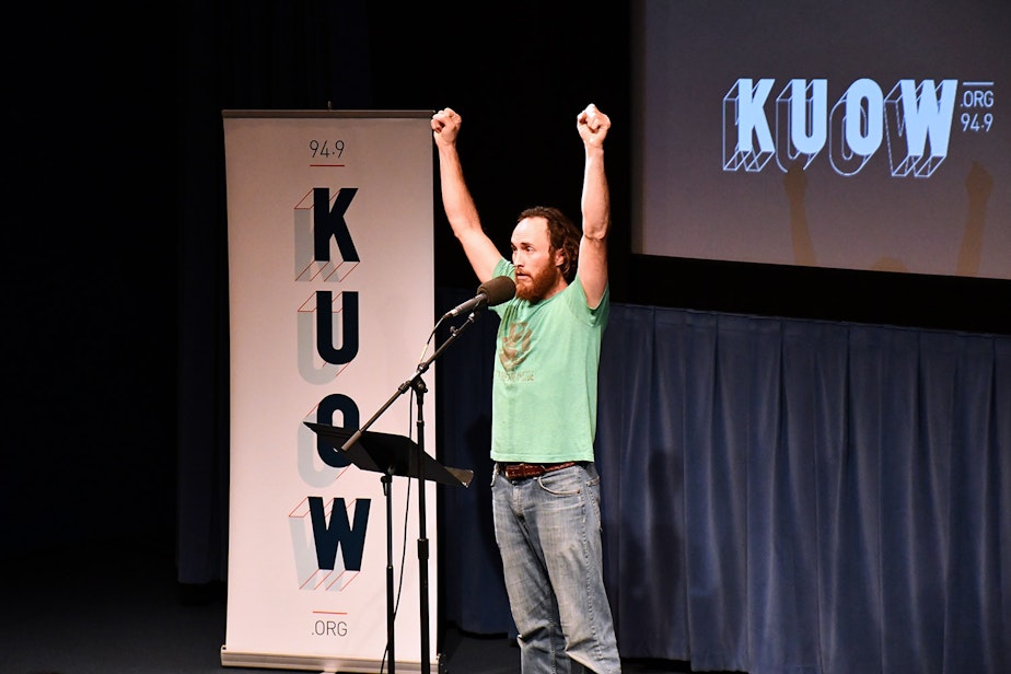 caption: Monte Montepare performs his story at KUOW's Stories from THE WILD event on Friday, October 11, 2019, at McCaw Hall in Seattle.