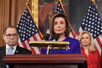 caption: House Speaker Nancy Pelosi and the chairs of investigative committees announce the articles of impeachment against President Trump on Tuesday.