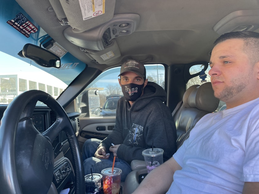 caption: Dylan Costello (right), 25, and 28-year-old Bobby Manson, construction workers from Quincy, Mass., are all in for Trump but say they don't support what the rioters did on Wednesday.