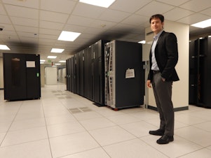 caption: Michael Mattmiller in one of Seattle's secret data centers. He says data helps government work better, but he's trying to cut back a bit and disseminate a uniform data privacy policy across all city departments.