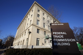 caption: The Federal Trade Commission building is seen, Jan. 28, 2015, in Washington. U.S. companies would no longer be able to bar employees from taking jobs with competitors under a rule approved by the FTC on Tuesday, April 23, 2024, though the rule seems sure to be challenged in court.