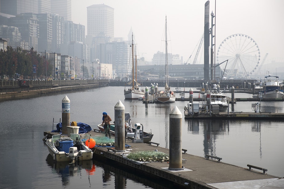caption: Downtown Seattle is shrouded with smoke from wildfires burning in California and Oregon on Friday, September 11, 2020. 