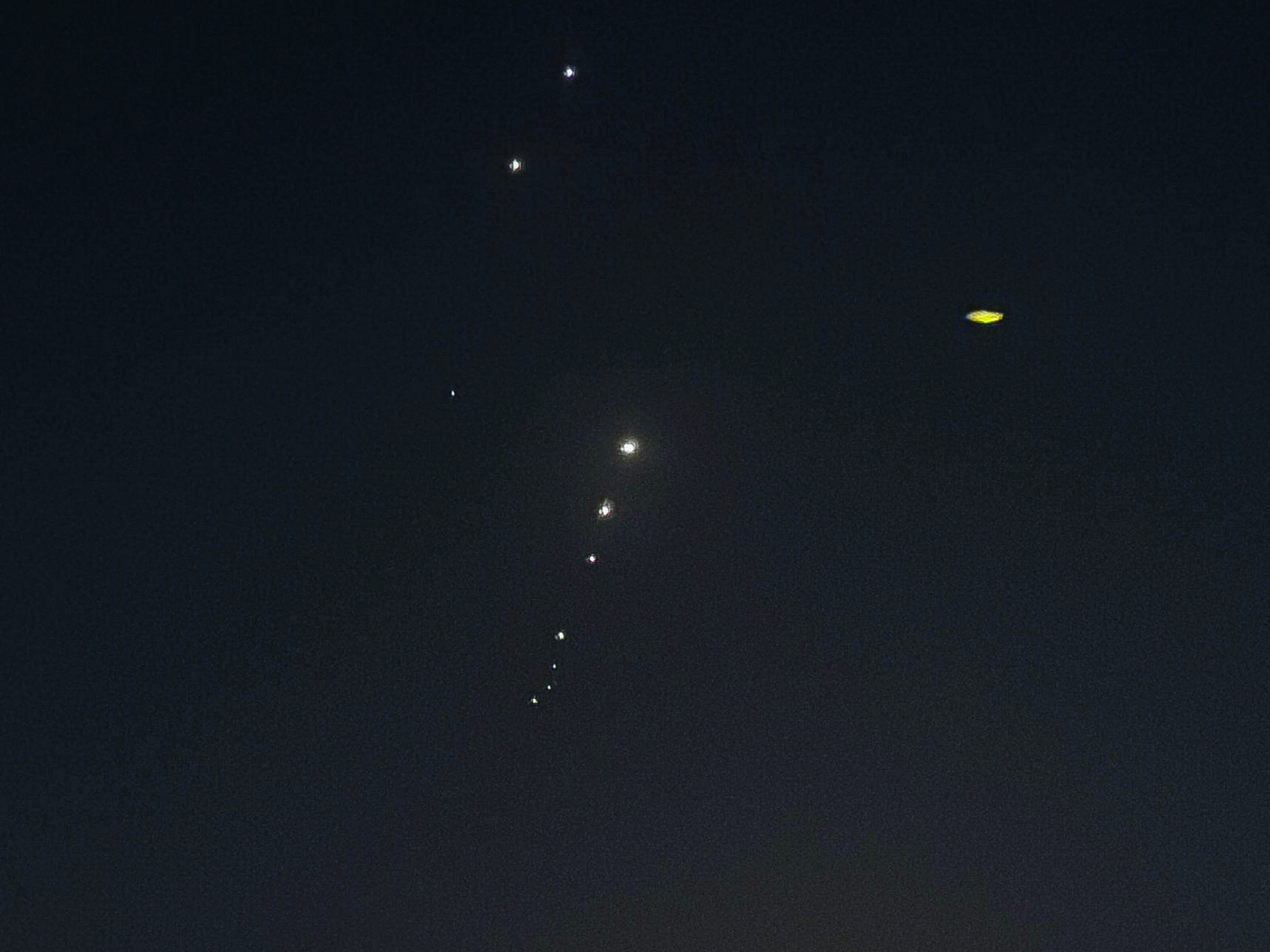 caption: Traces are seen in the sky after Iran's armed forces say they targeted Al-Udeid base in a missile attack in Qatar on Monday.