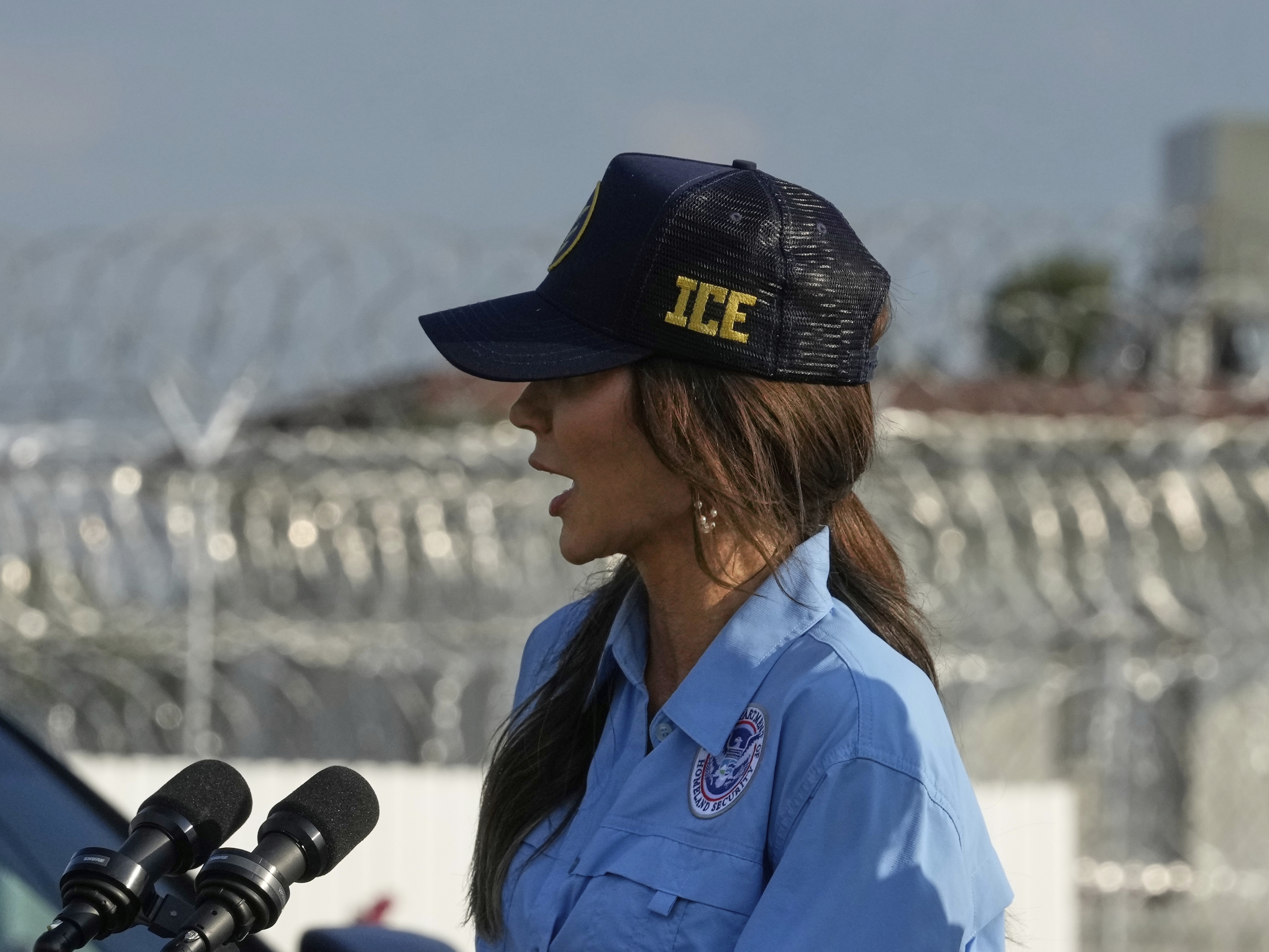 caption: Homeland Security Secretary Kristi Noem speaks to reporters before touring "Camp 57," a facility to house immigration detainees at the Louisiana State Penitentiary in Angola, La., Wednesday, Sept. 3, 2025.
