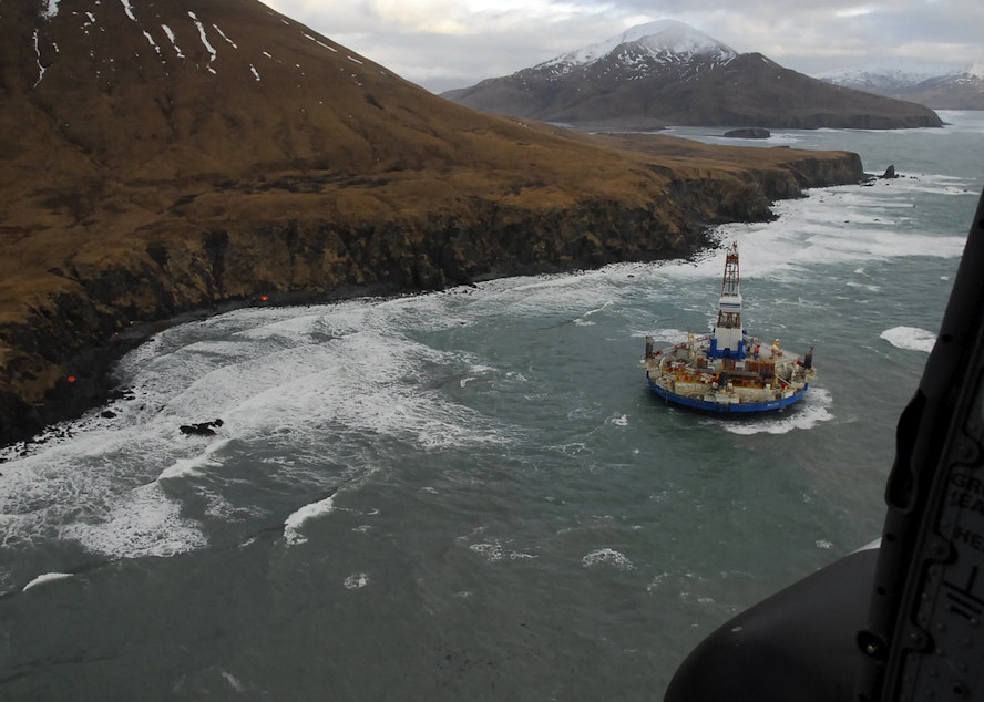 caption: The drilling rig Kulluk was grounded in 2013 after efforts by U.S. Coast Guard and tug vessel crews to move the vessel to a safe harbor during a winter storm during a tow from Dutch Harbor, Alaska, to Everett, Wash.