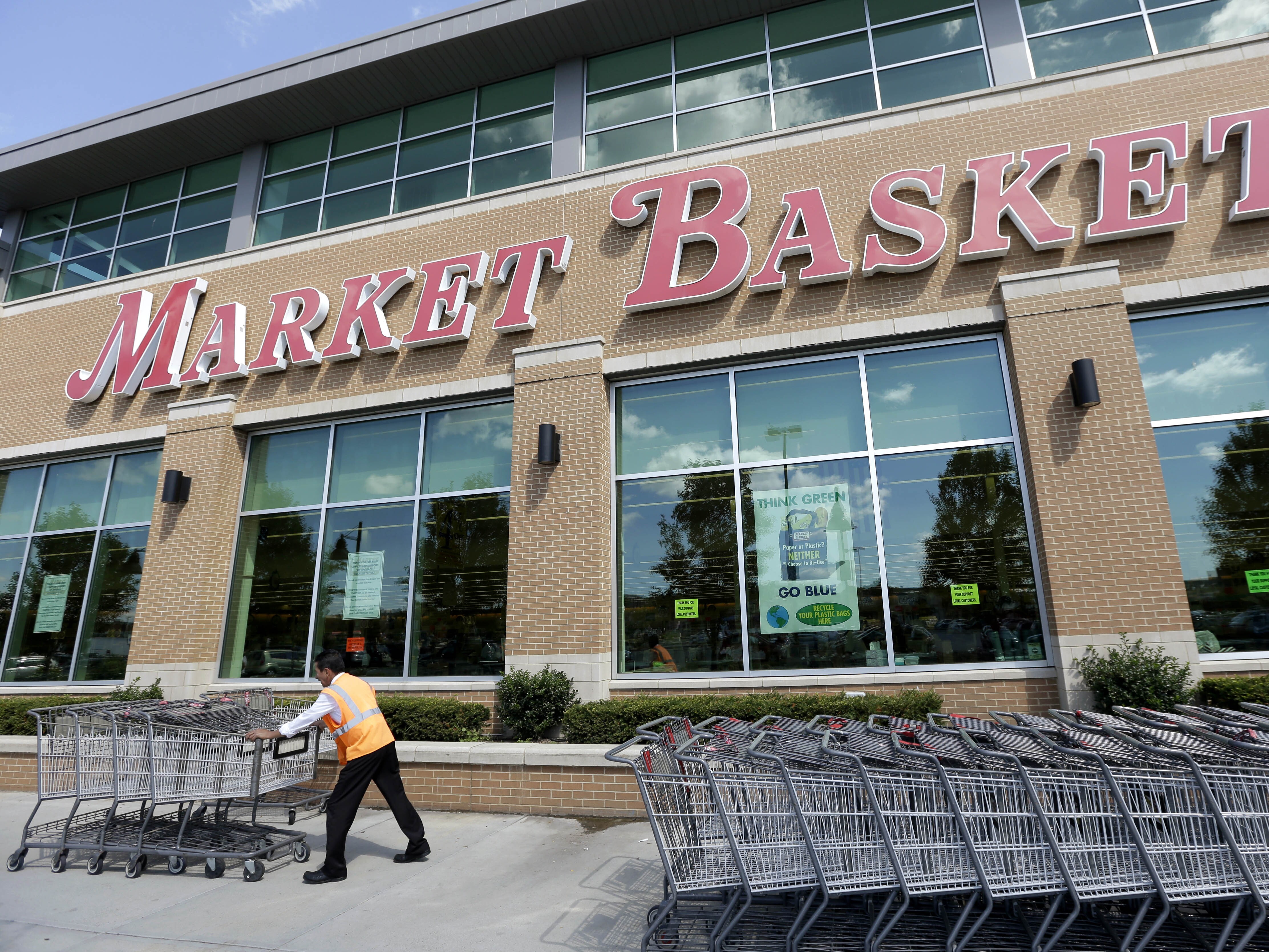 caption: Market Basket's board says it has placed CEO Arthur T. Demoulas on leave, citing allegations that he was planning a work stoppage among employees at the family-controlled supermarket chain. One of the Massachusetts-based grocer's stores is seen here in 2014, when Demoulas thwarted an attempt to force him out.