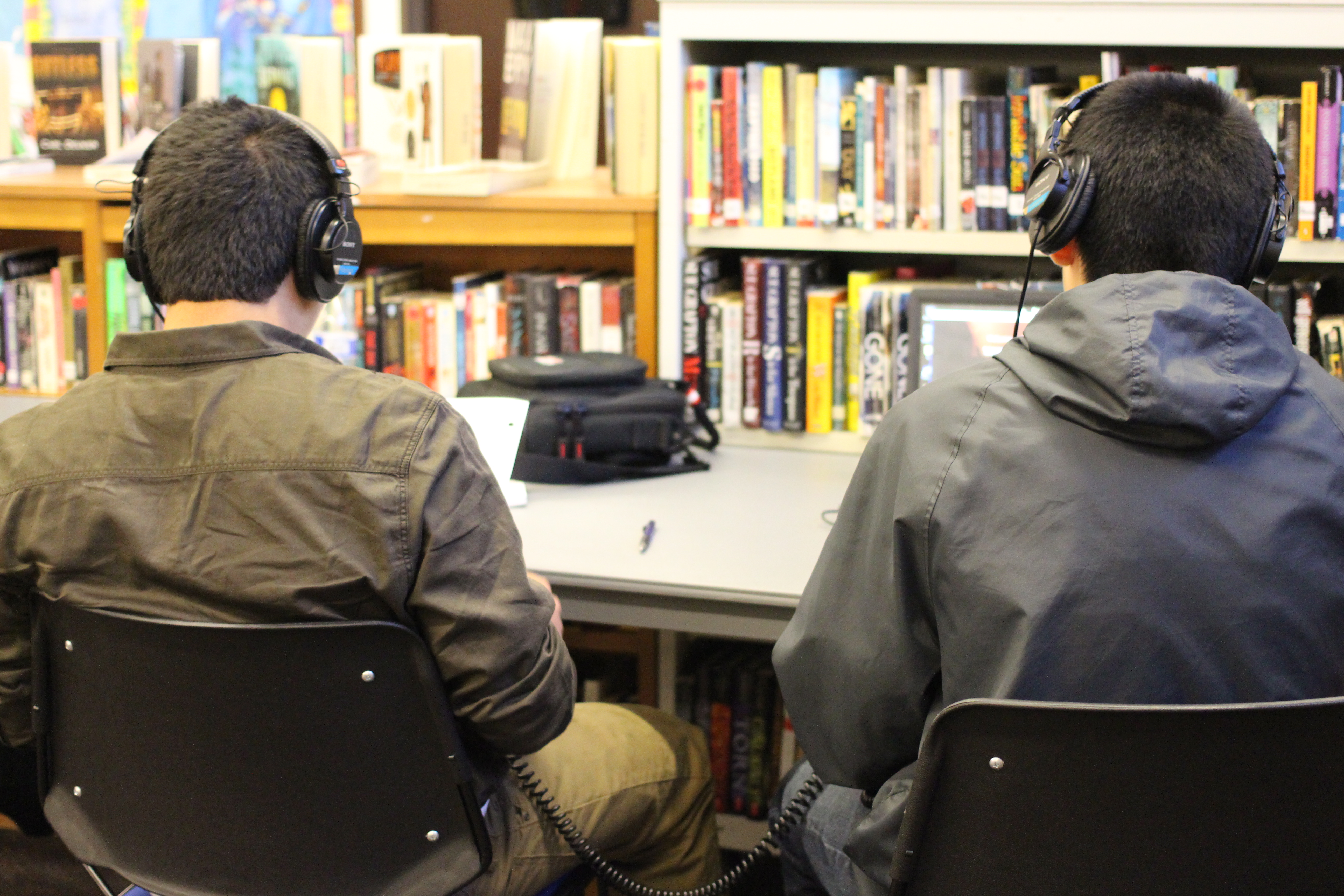 caption: The two creators of this piece practice their flow before recording.