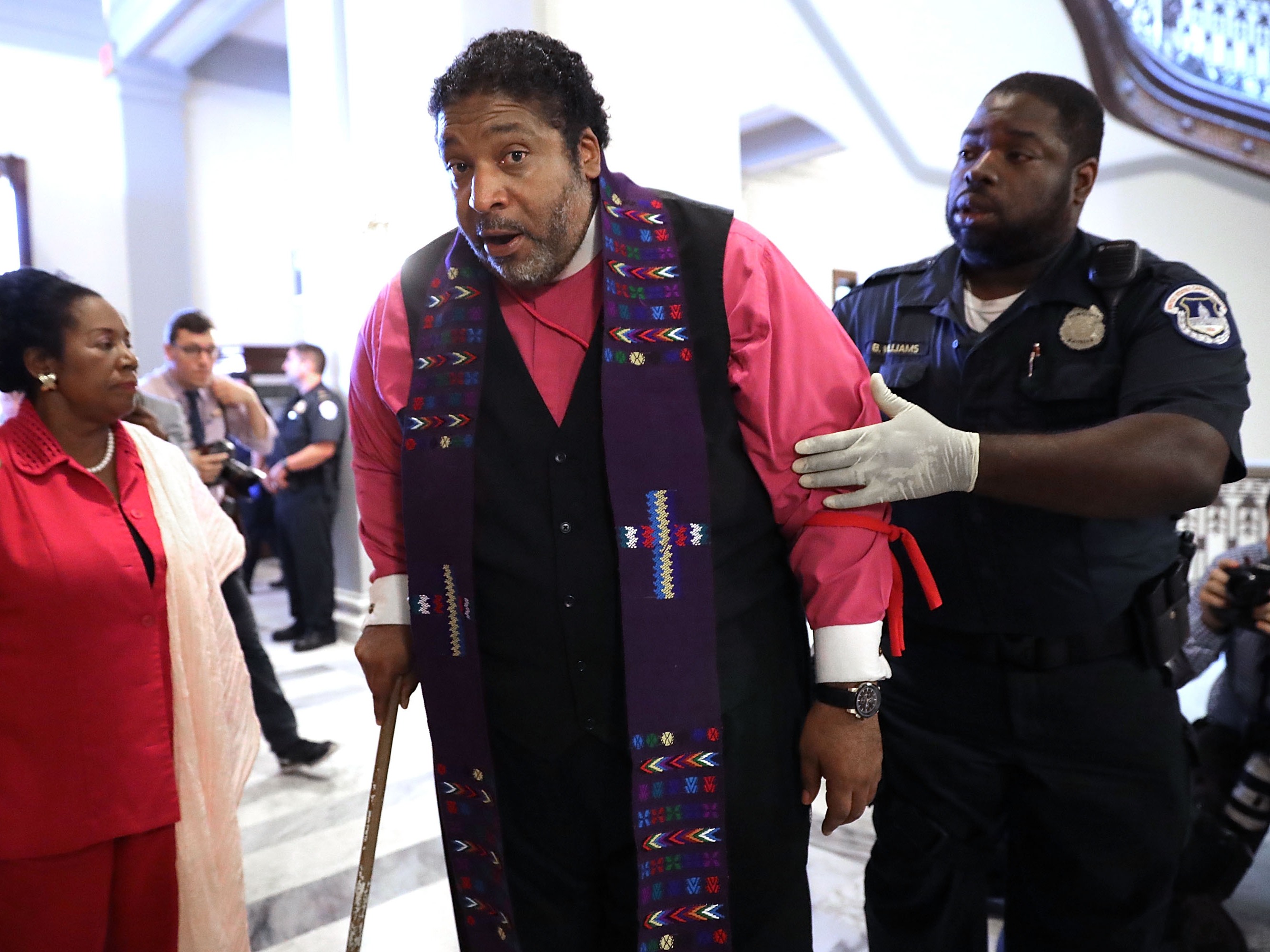 caption: Rev. Dr. William Barber has long been known for his civil rights activism, including being arrested as part of nonviolent demonstrations.