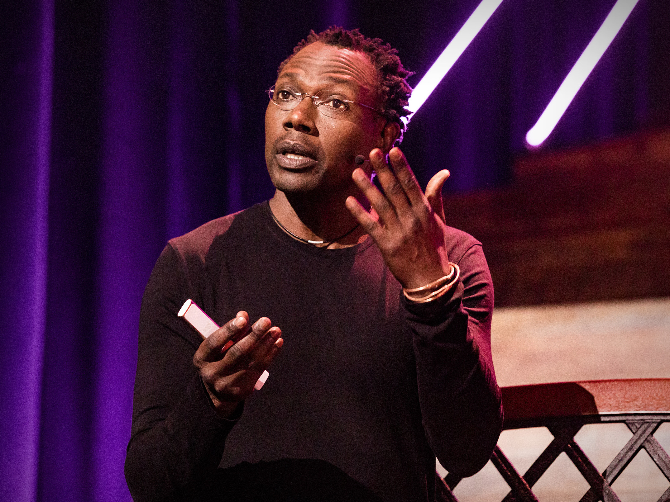 caption: Dixon Chibanda on the TED stage.