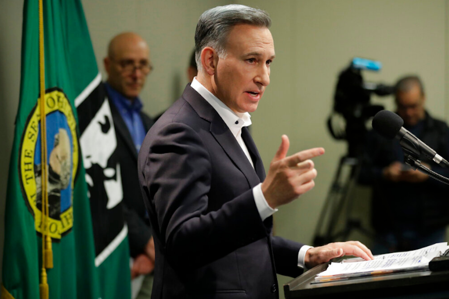 caption: King County Executive Dow Constantine talks to reporters, Wednesday, March 4, 2020, during a news conference in Seattle. 