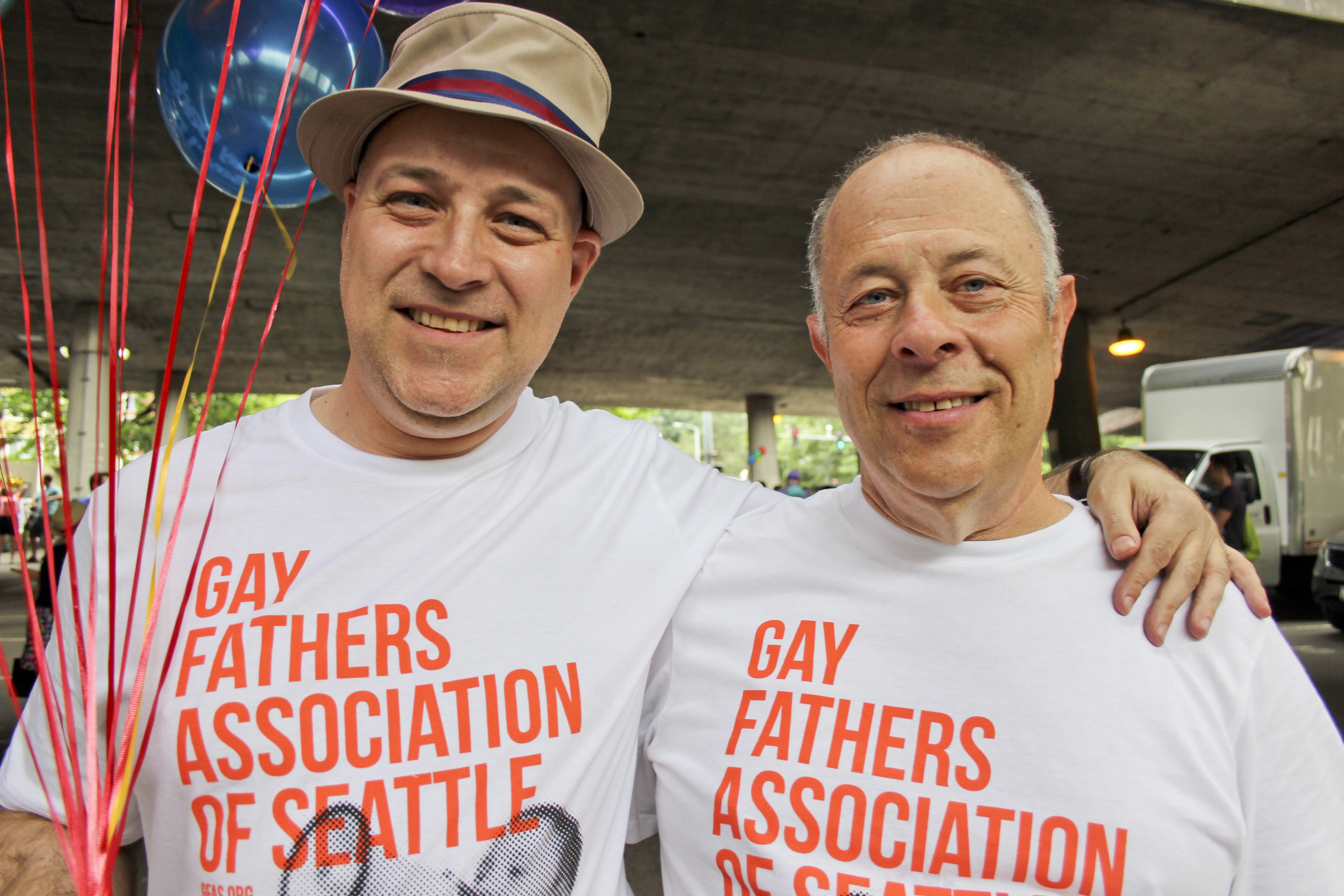 caption: Steven, left, and Ed Malick were both married to women before coming out as gay. 