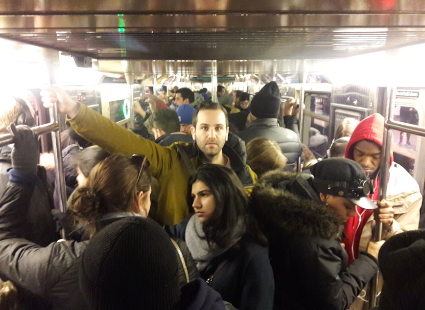 caption: A crowded subway in New York in November, 2018