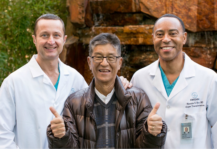 caption: Don Elliget, a patient at Swedish Hospital in Seattle, with transplant surgeons, Drs. Andrew Precht and Marquis Hart.
