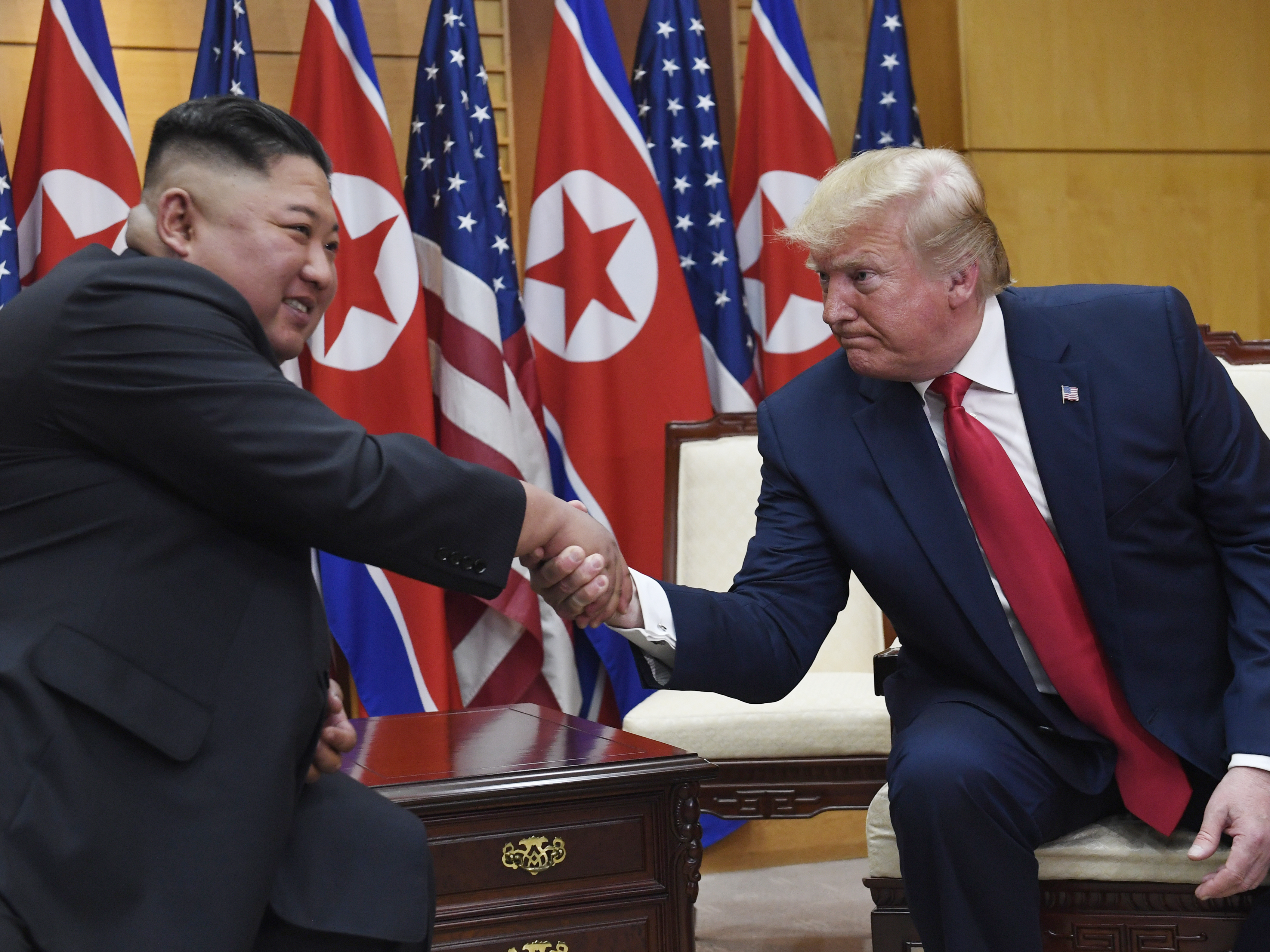 caption: President Trump meets with North Korean leader Kim Jong Un at the border village of Panmunjom in the Demilitarized Zone, South Korea.