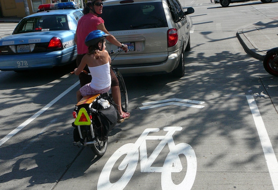caption: Do you travel a la mode? Seattle Mayor Ed Murray unveiled a plan Wednesday to end what he called the "mode wars."