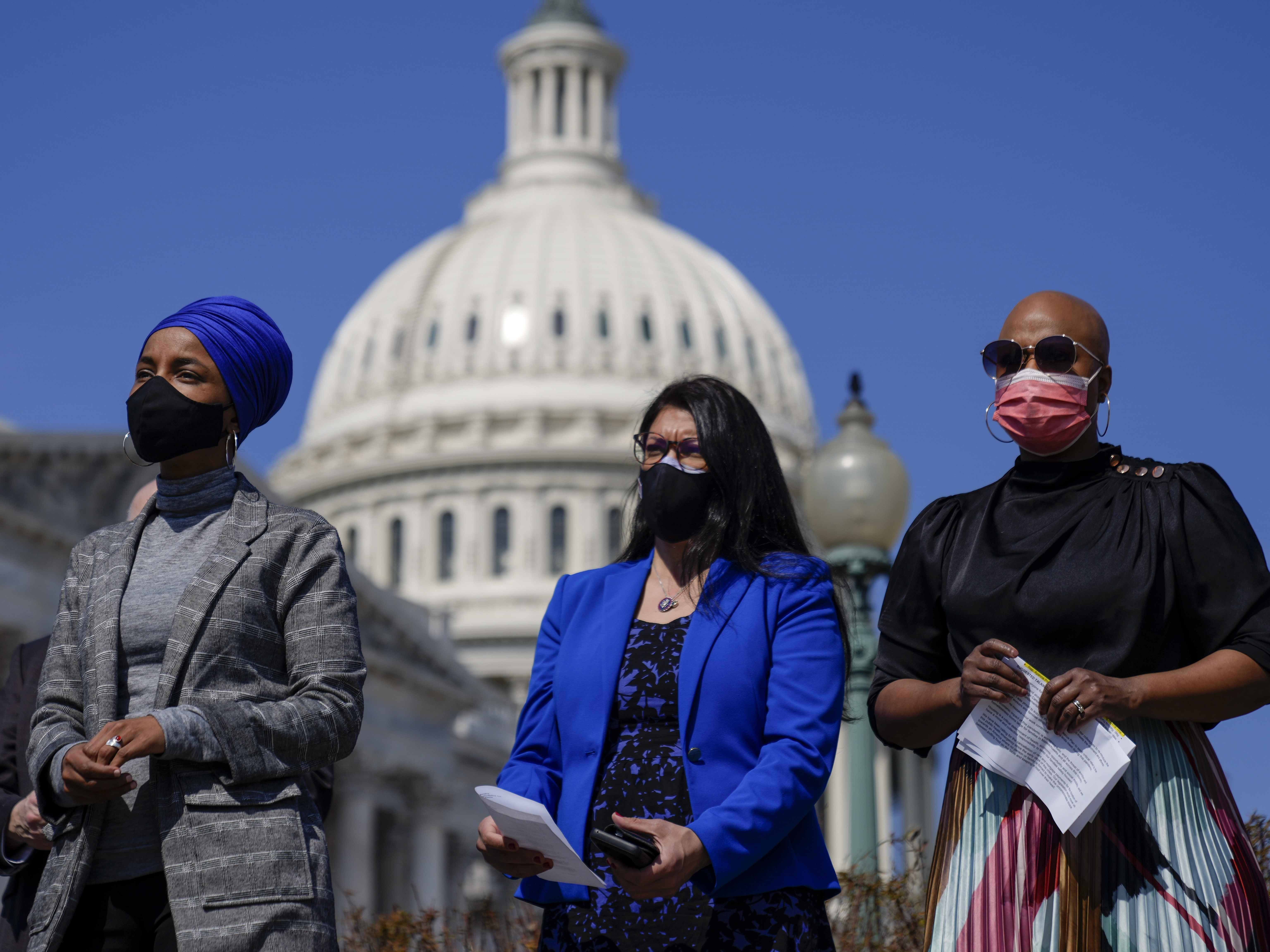 caption: Reps. Ilhan Omar (from left), Rashida Tlaib and Ayanna Pressley, seen here at a news conference last month outside the U.S. Capitol, are among those calling on the Biden administration to lift the cap on refugees.