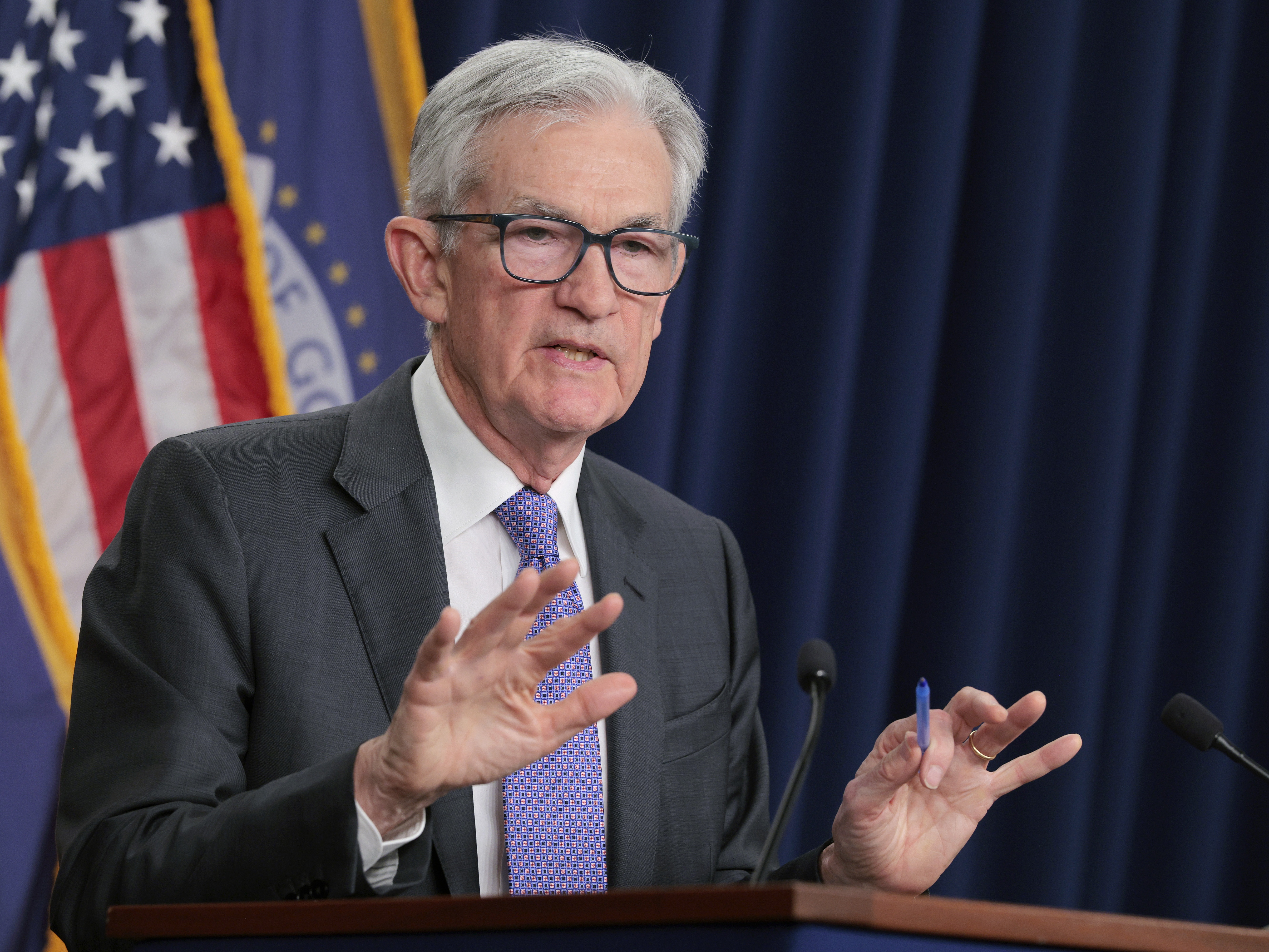 caption: Federal Reserve chairman Jerome Powell and his colleagues held their benchmark interest rate steady Wednesday.  President Trump has been waging a pressure campaign to get the central bank to lower rates more aggressively.