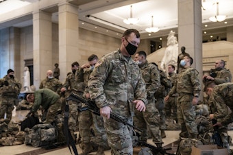 caption: National Guard troops are inside the U.S. Capitol Visitor Center to reinforce security Wednesday at the Capitol in Washington. It comes a week after an insurrection at the Capitol.
