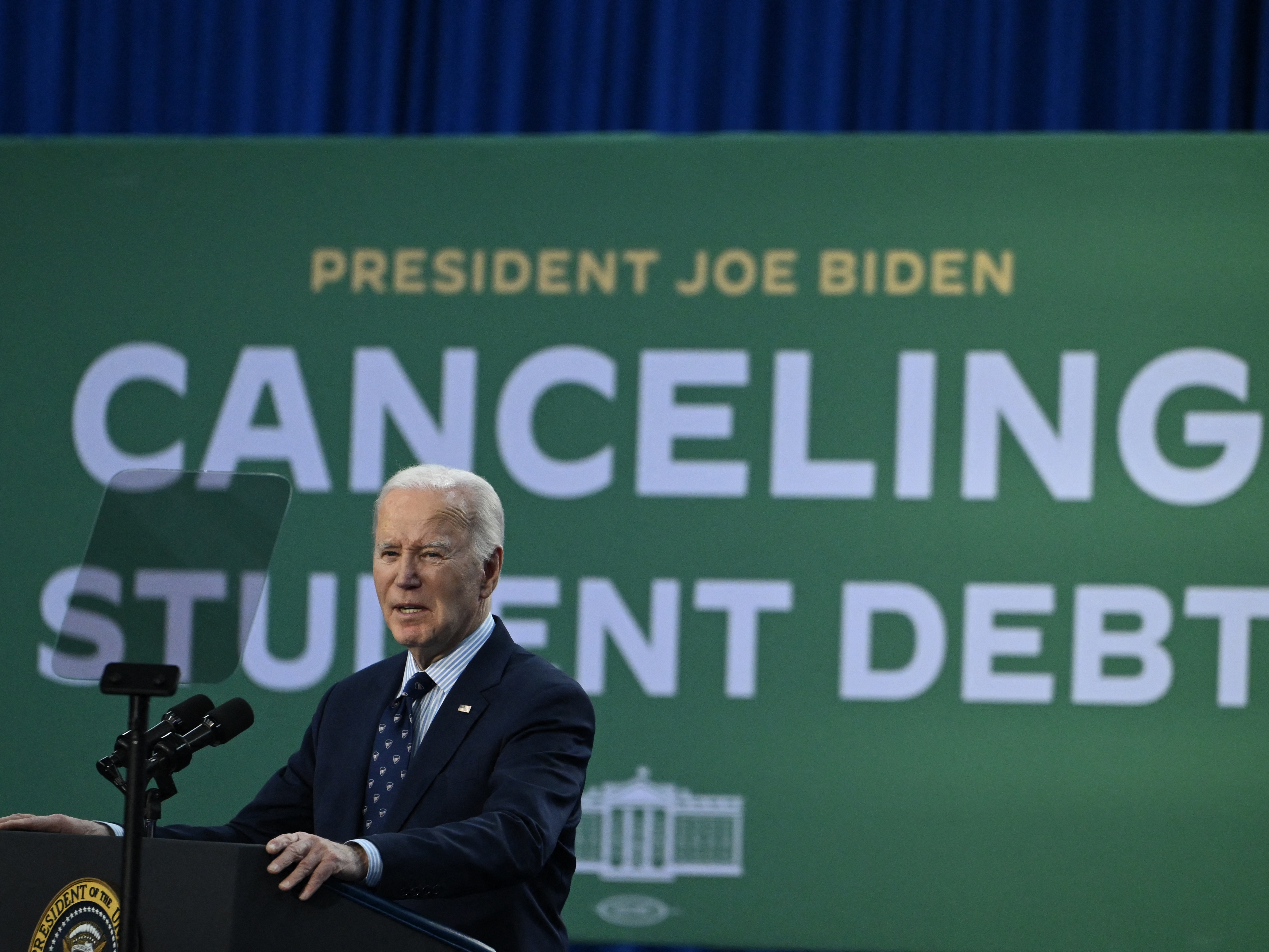 caption: President Joe Biden speaks about student loan relief at Madison College in Madison, Wisconsin, on April 8.