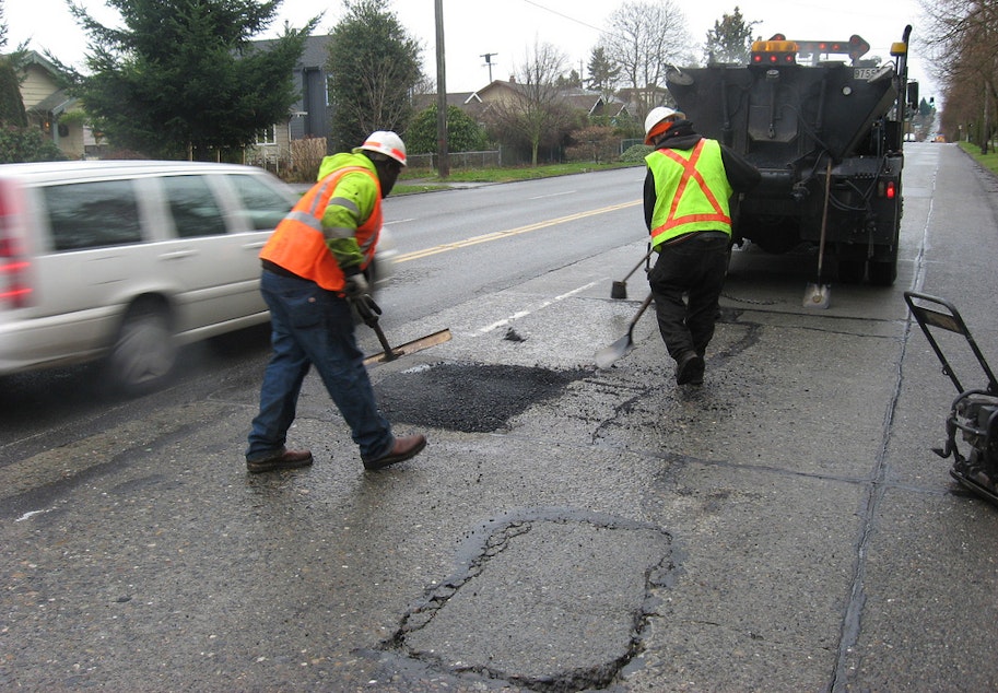 caption: City of Seattle pothole rangers at work in 2011.