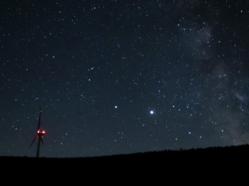 caption: Saturn (center, left) and Jupiter (center, right) share a night sky earlier this year near Vantage, Wash. Already this past summer, the two planets were growing closer in the night sky.