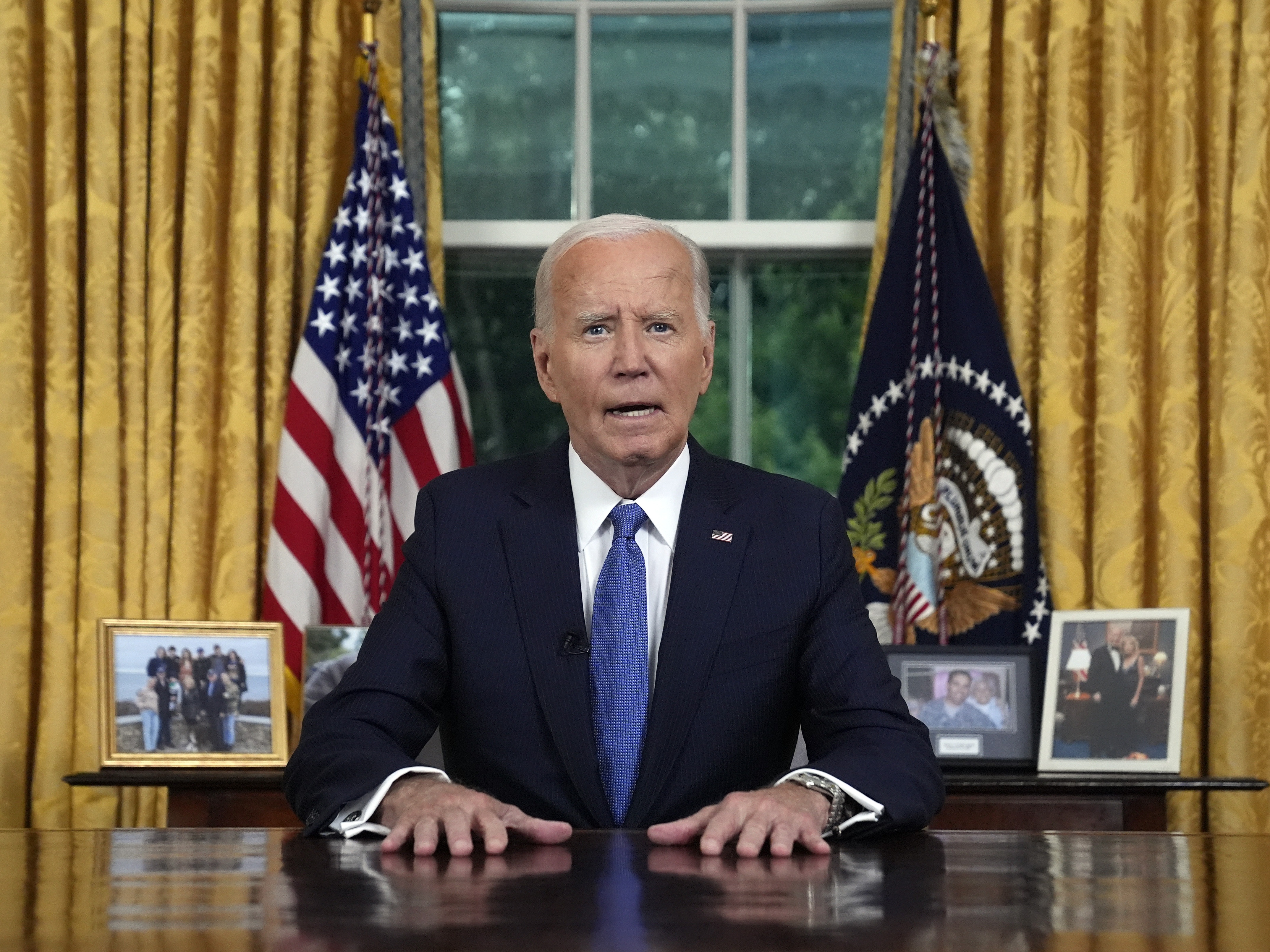 caption: President Joe Biden addresses the nation from the Oval Office of the White House in Washington, Wednesday, July 24, 2024, about his decision to drop his Democratic presidential reelection bid.