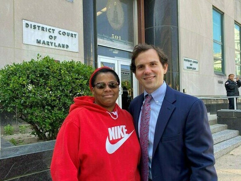 caption: Baltimore attorney Joseph Loveless with Keisha, a tenant he recently represented in rent court. Maryland is among a growing number of places that guarantee lawyers for low-income renters facing eviction. (Keisha didn't want to give her last name for fear of retaliation from her landlord.)