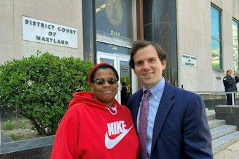 caption: Baltimore attorney Joseph Loveless with Keisha, a tenant he recently represented in rent court. Maryland is among a growing number of places that guarantee lawyers for low-income renters facing eviction. (Keisha didn't want to give her last name for fear of retaliation from her landlord.)