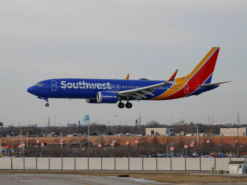 caption: Southwest Airlines says more than 16,700 of its flights were cancelled between Dec. 21-31, which will cost the company as much as $825 million.