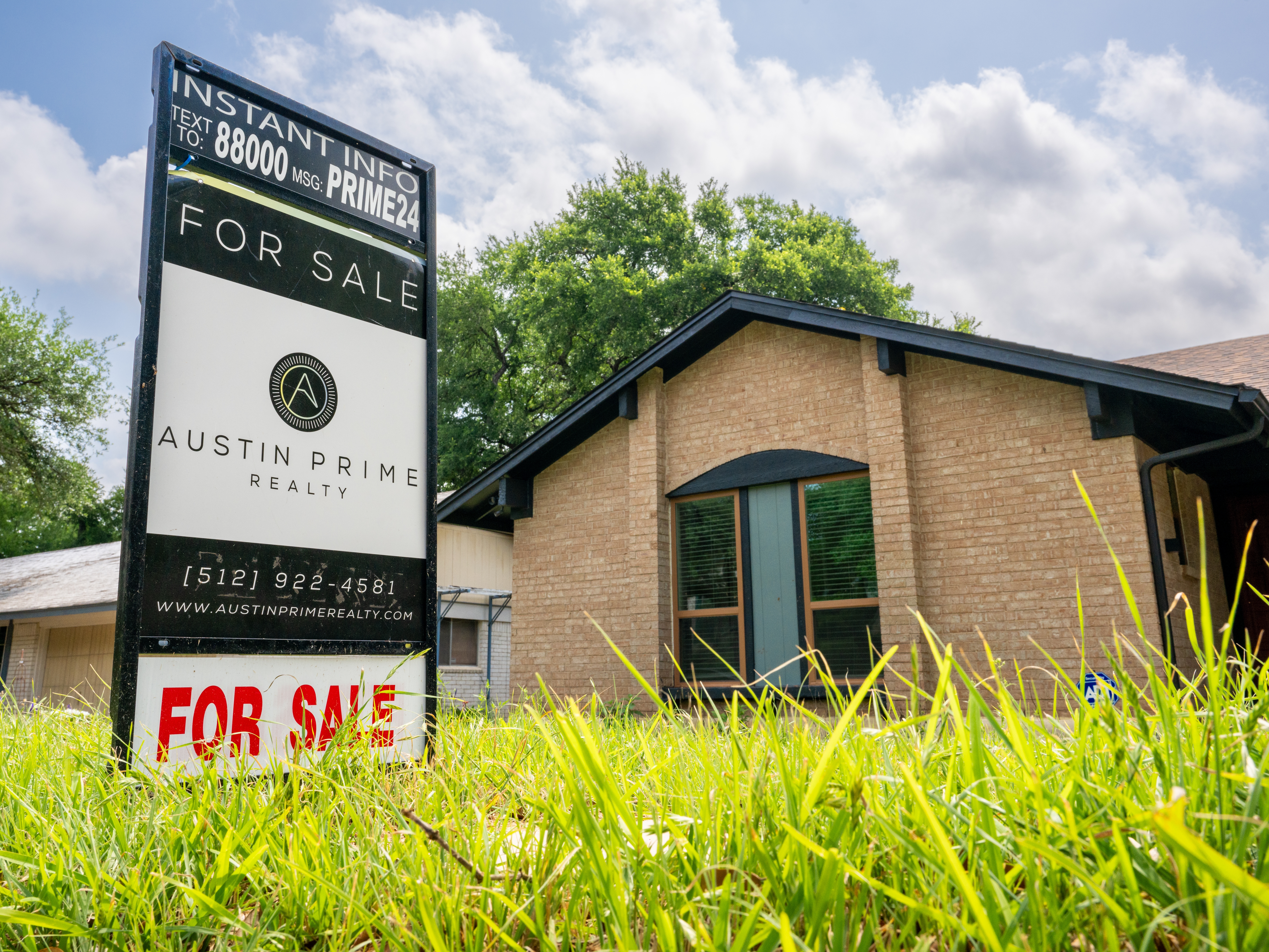 caption: A home is seen for sale on April 24 in Austin, Texas.