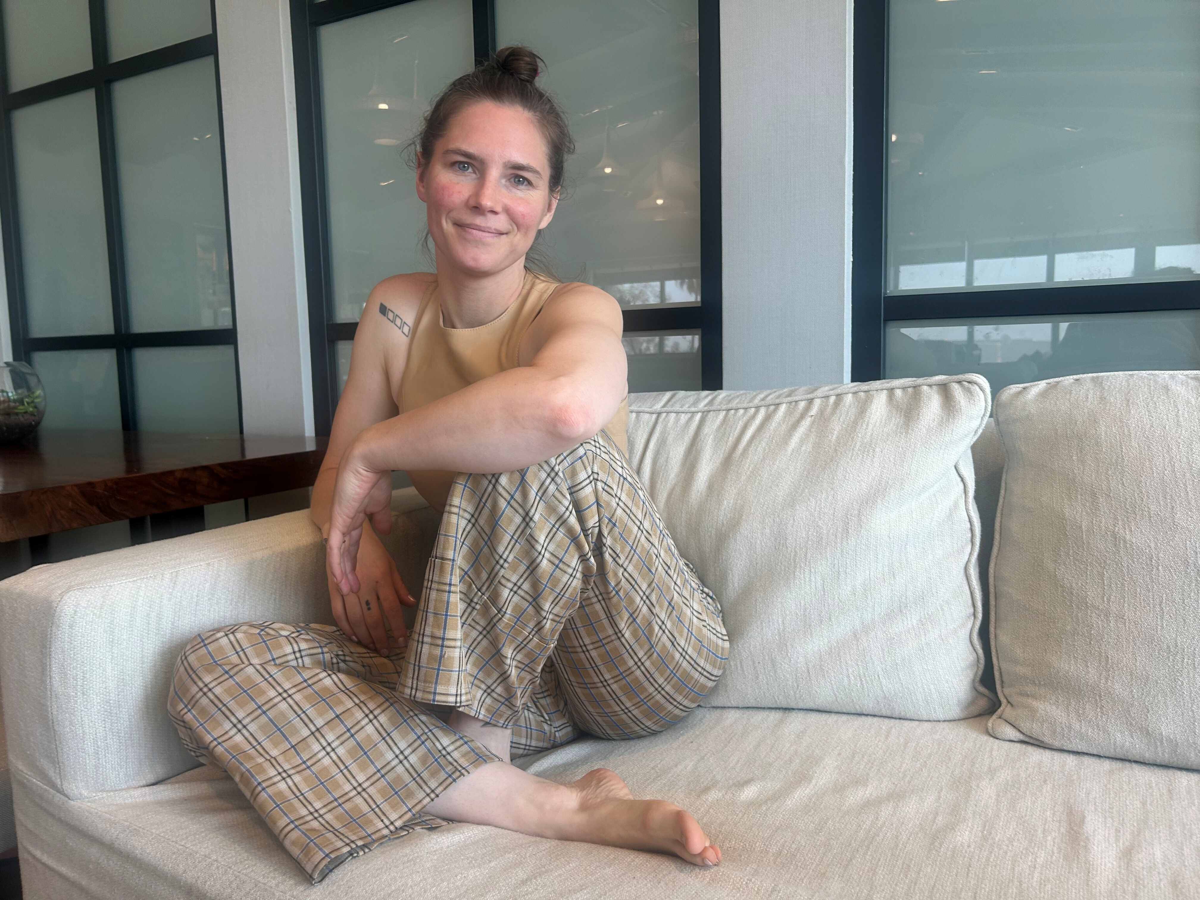 caption: Amanda Knox in a hotel in West Hollywood, Calif.