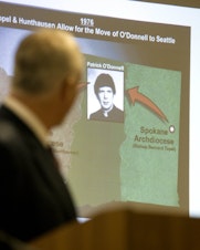 caption: In a 2009 lawsuit against the Seattle Archdiocese, an attorney demonstrates how the Spokane Diocese transferred child molester Patrick O’Donnell to the Seattle region, where O’Donnell attended graduate school.