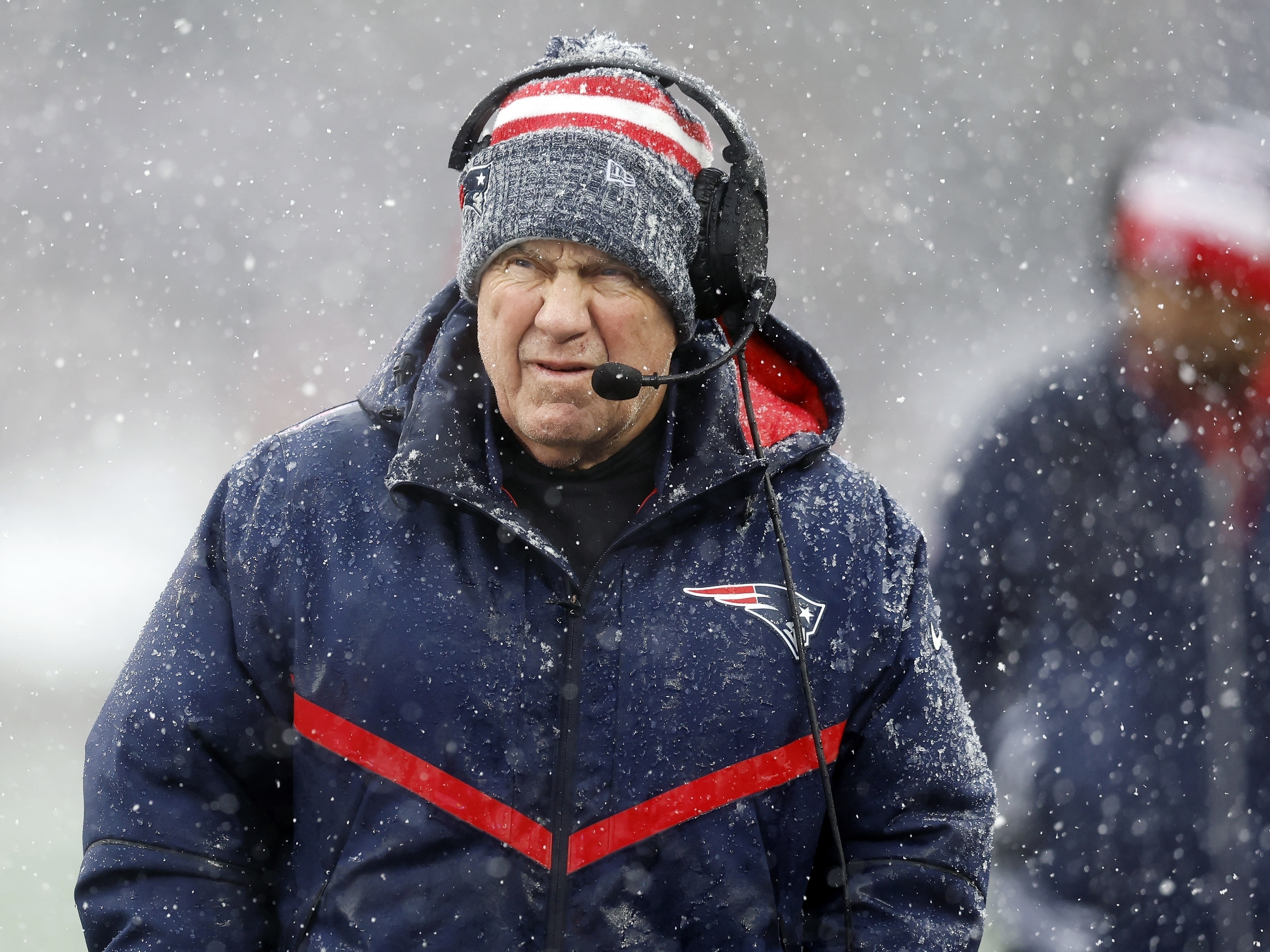 caption: Bill Belichick appears on the sideline during his last game as head coach of the New England Patriots on Jan. 7, 2024, in Foxborough, Mass.