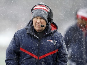 caption: Bill Belichick appears on the sideline during his last game as head coach of the New England Patriots on Jan. 7, 2024, in Foxborough, Mass.