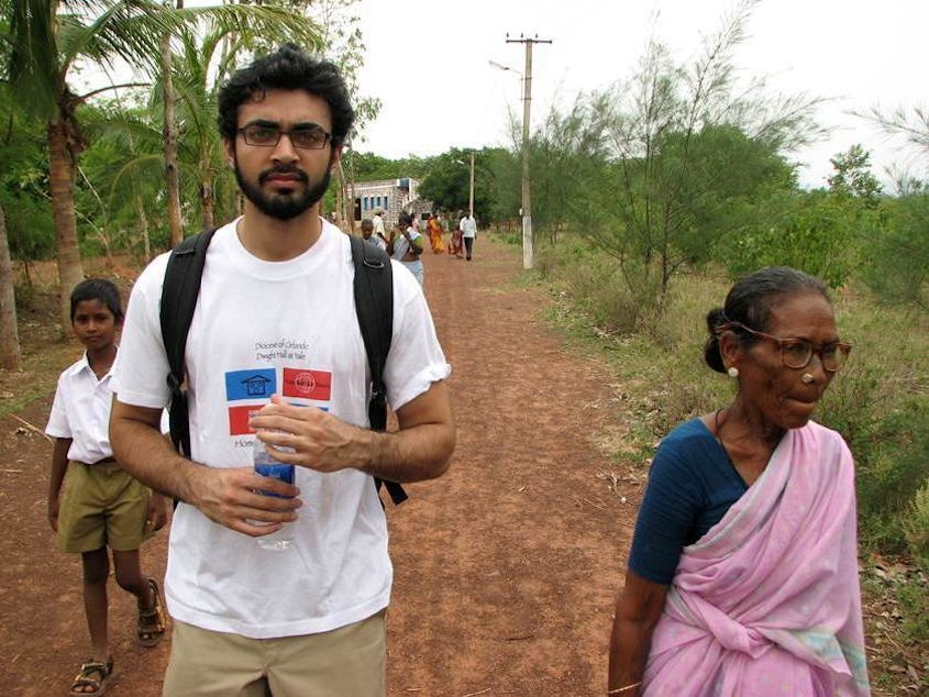 caption: Abraar Karan spent time in rural India in 2008 while working for Unite for Sight, a nonprofit group that provides eye care. Above: He interviews a woman about the challenge of living from severe cataracts.