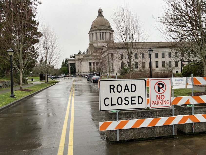 caption: Washington's Capitol building will be closed to the public during the 2021 legislative session because of COVID-19. Most lawmakers will work remotely and public testimony will happen via Zoom. 