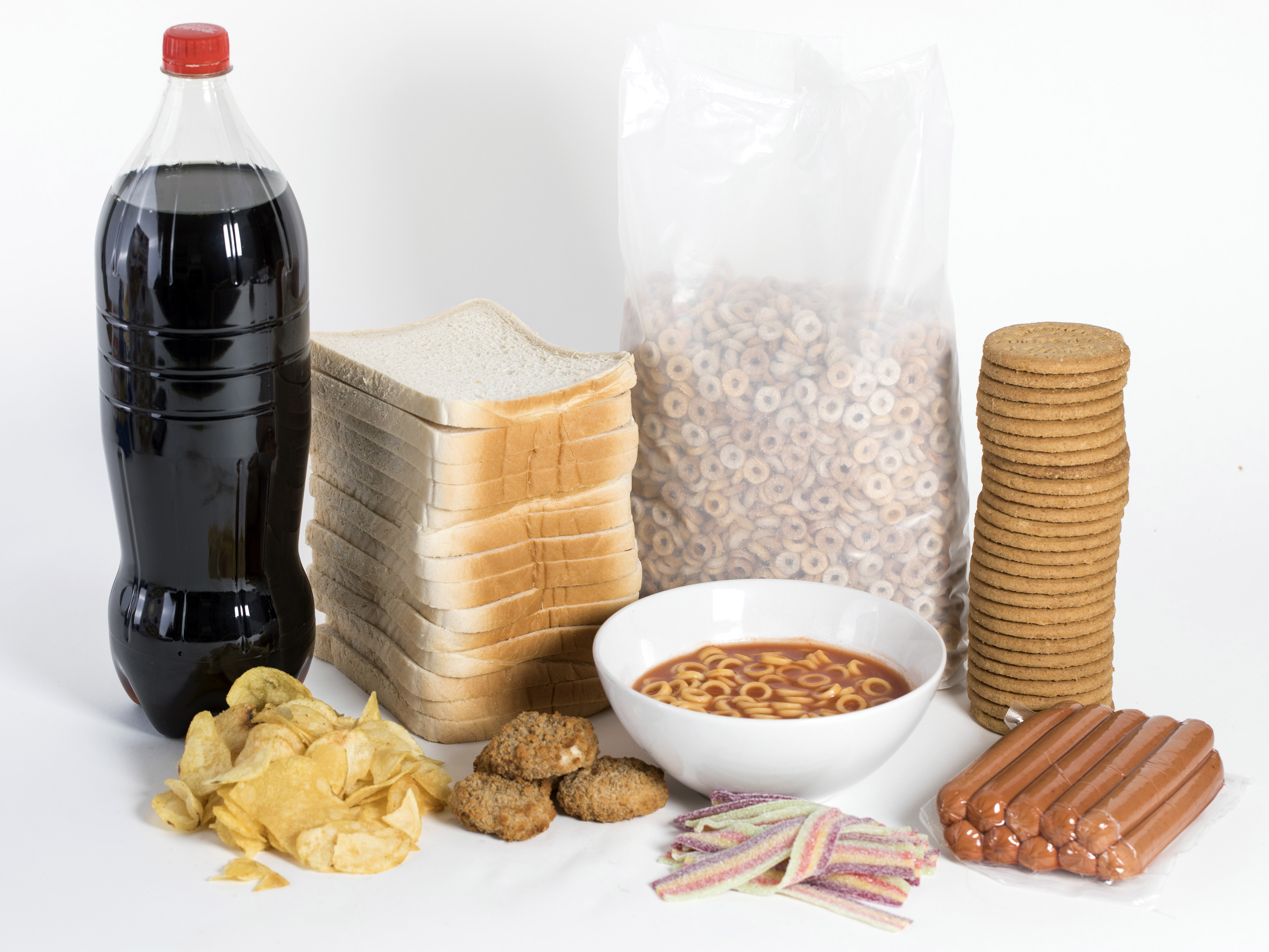 caption: There isn't a standard definition of ultra-processed foods, but all the foods pictured fit the bill. They contain added fat, sugar or salt, plus preservatives to extend their shelf-life.