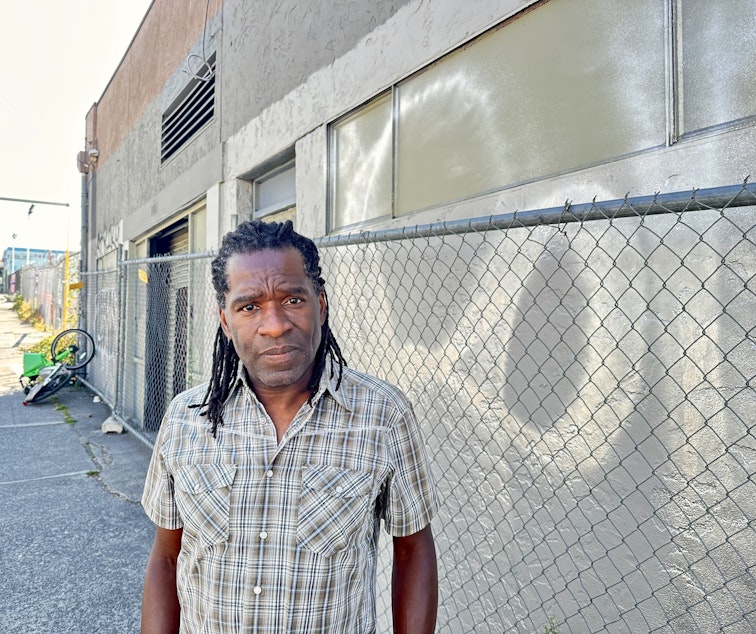 caption: Joe Clark on South King Street in Seattle's Chinatown-International District.