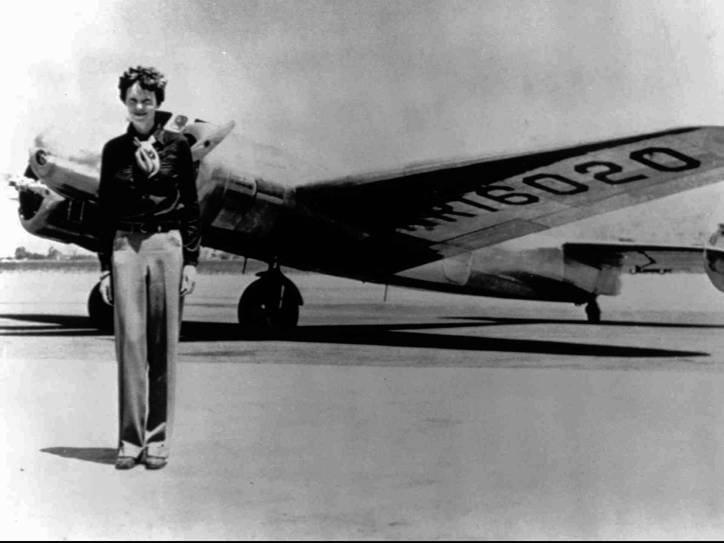 caption: Amelia Earhart stands next to her Lockheed Electra 10E, before her last flight in 1937 from Oakland, Calif., bound for Honolulu. Her disappearance remains one of aviation's biggest mysteries.