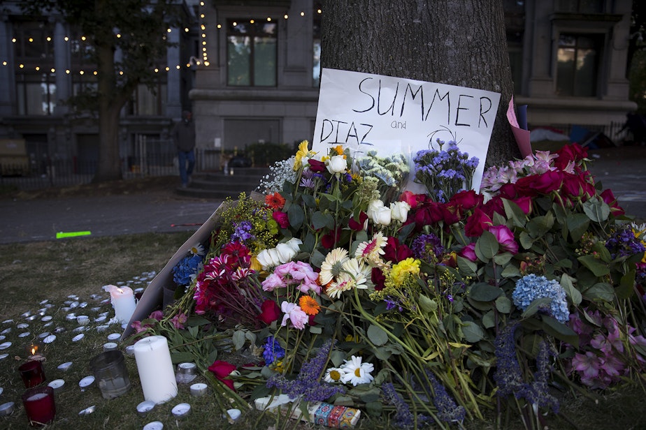 caption: A memorial for Summer Taylor and Diaz Love is shown on Wednesday, July 22, 2020, at City Hall Park in Seattle. 