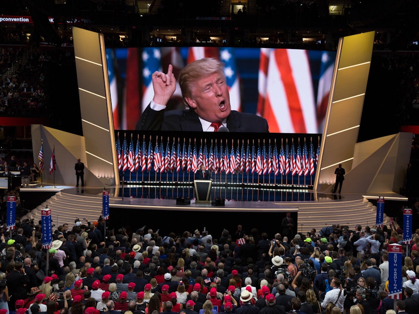caption: Donald Trump delivers the keynote address during the 2016 Republican National Convention. Despite the coronavirus, Republicans say they are moving ahead with plans for their 2020 convention.