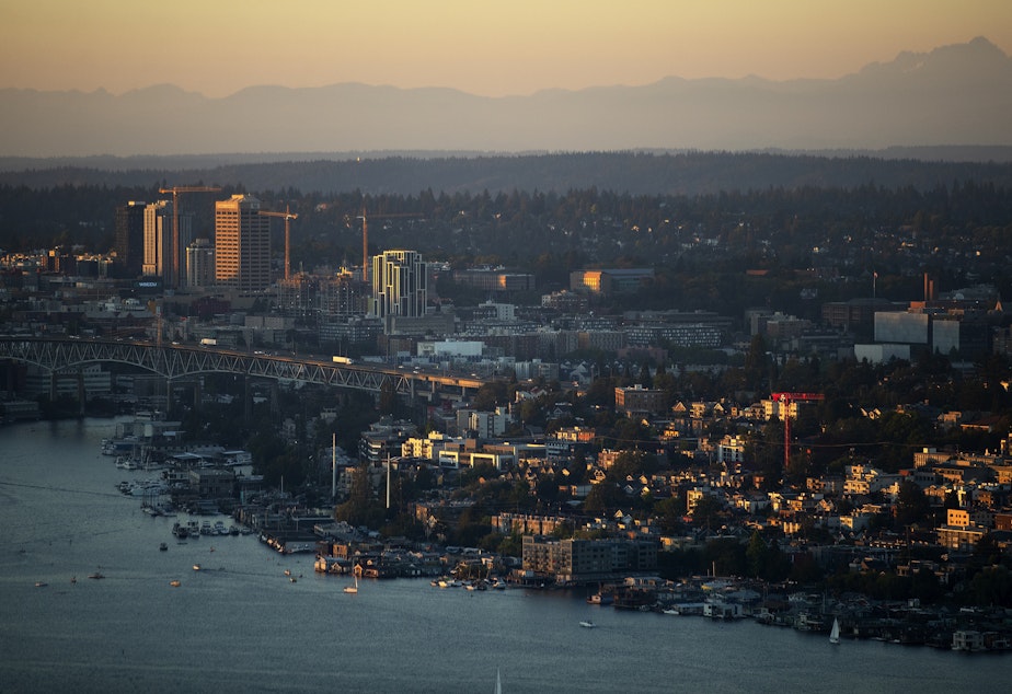caption: The sun sets over the east side of Lake Union on Monday, July 25, 2022, in Seattle. 