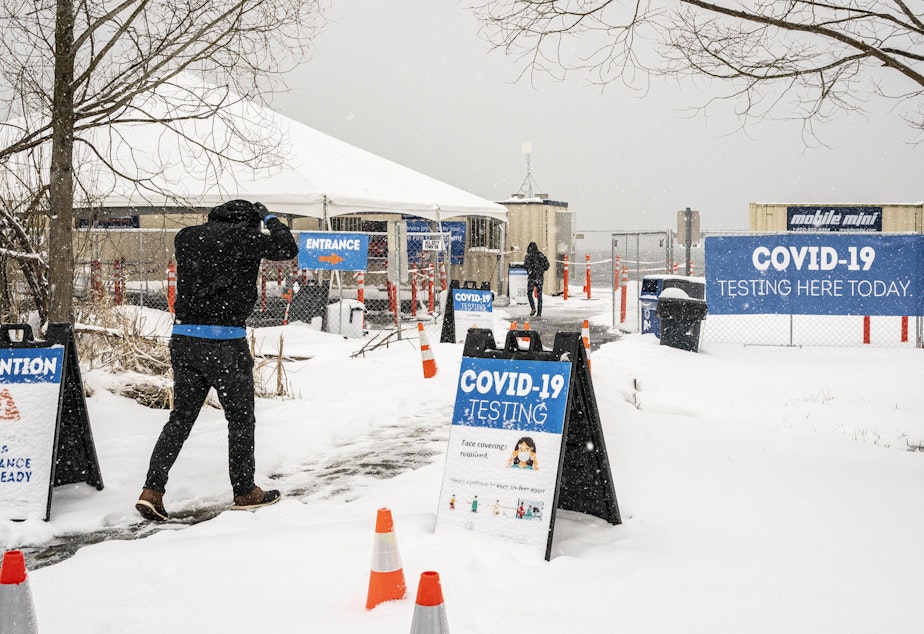 caption: The Biden administration announced on Wednesday a range of initiatives to expand testing capacity in the U.S. A COVID-19 testing site in Seattle is seen here on Saturday.