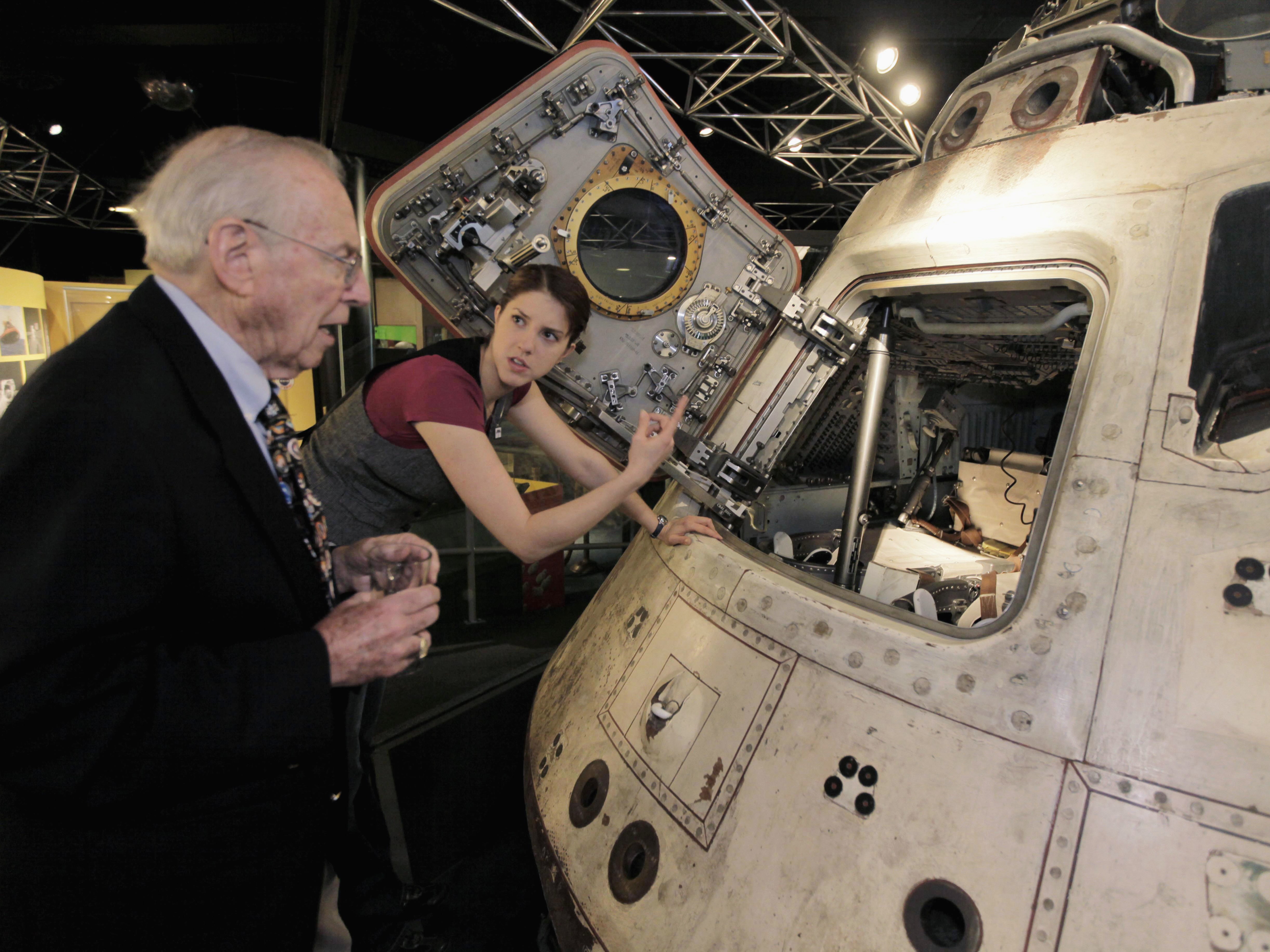 caption: In 2010, Jim Lovell explored his Apollo 8 spacecraft at the Museum of Science and Industry in Chicago.