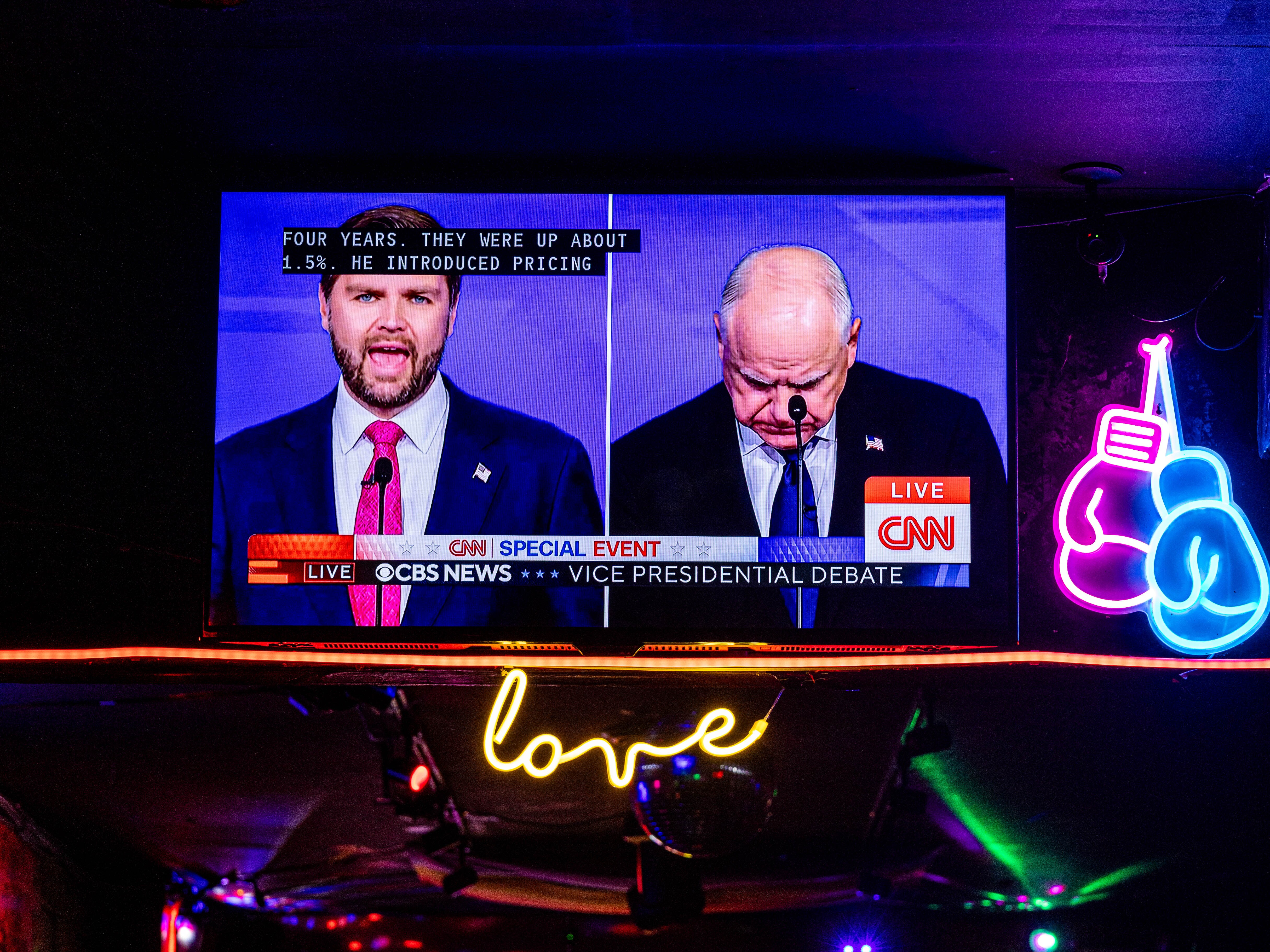 caption: Sen. JD Vance and Gov. Tim Walz spoke about school shootings in Tuesday night's debate.
