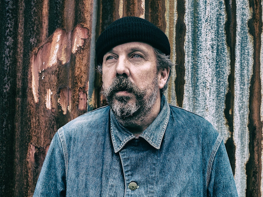 caption: One of the pioneers of London's acid house scene, Andrew Weatherall had an influential career as an electronic music artist, DJ and producer.