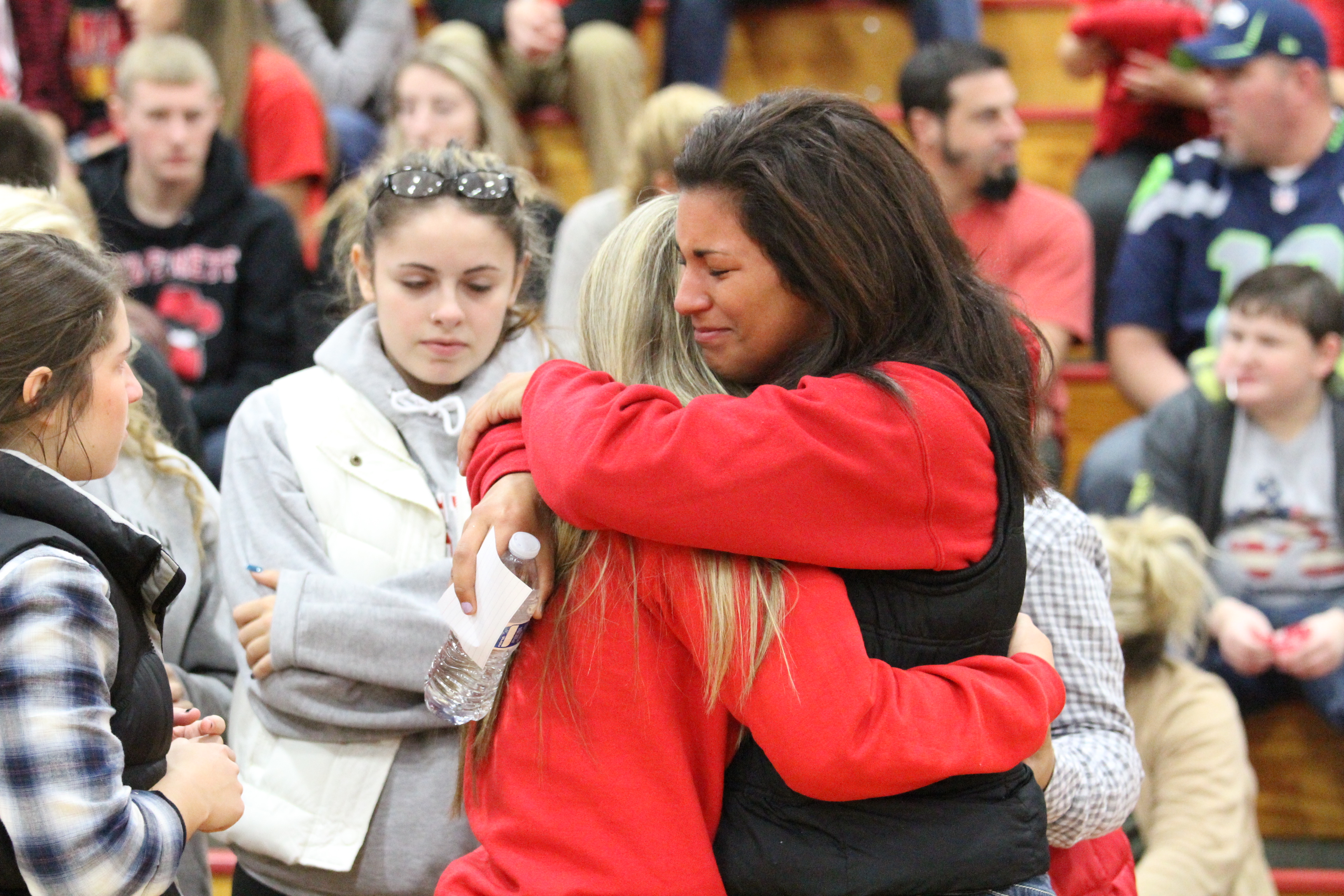 caption: Hundreds gather at the Marysville-Pilchuck High School gym to mourn the shooting that took place last Friday.