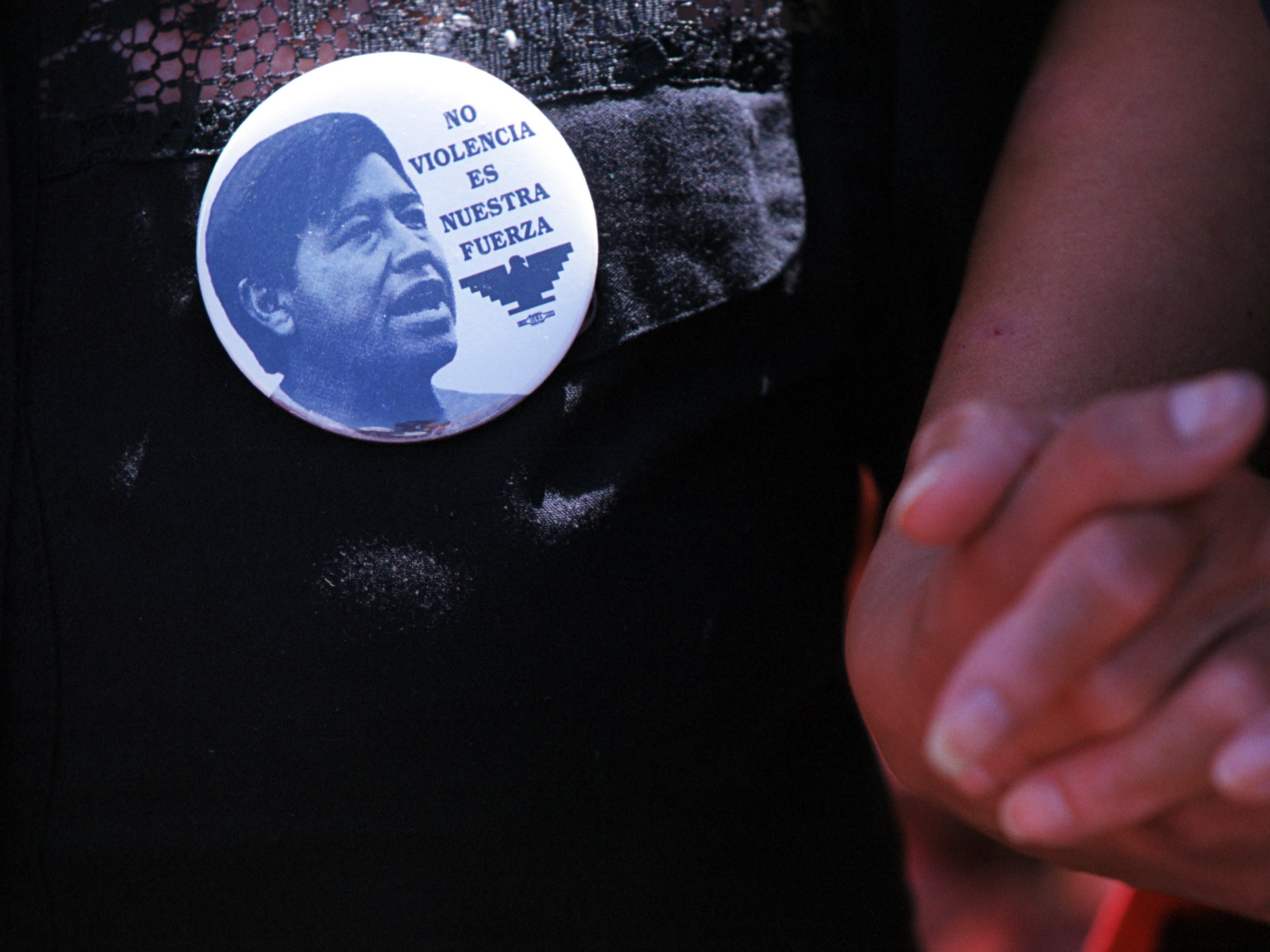 caption: A Cesar Chavez button is seen in El Paso, Texas, during a celebration of the civil rights leader on March 31, 2000.