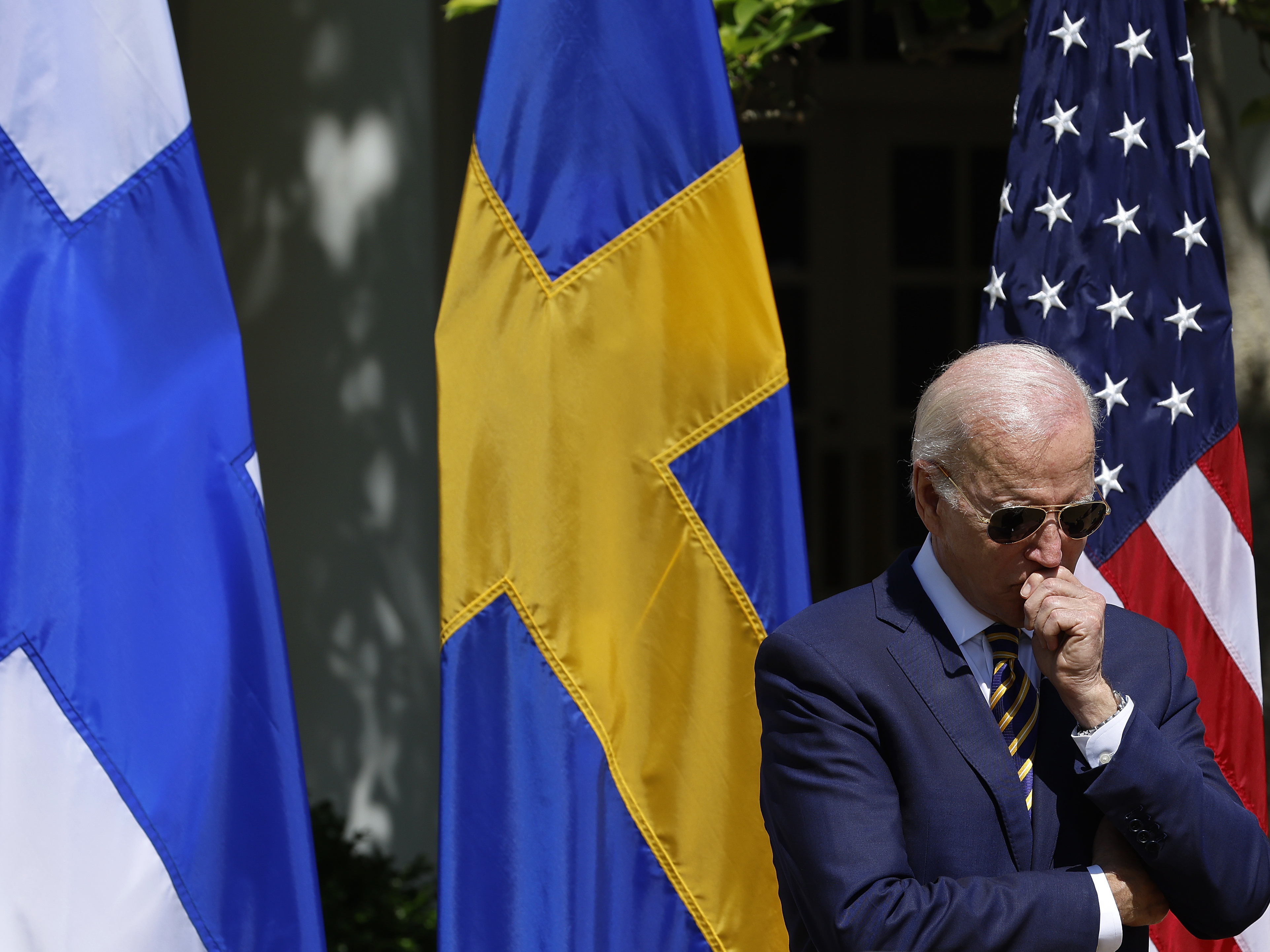 caption: Joe Biden listens to remarks by Finland's President Sauli Niinisto and Sweden's Prime Minister Magdalena Andersson at the White House this week.